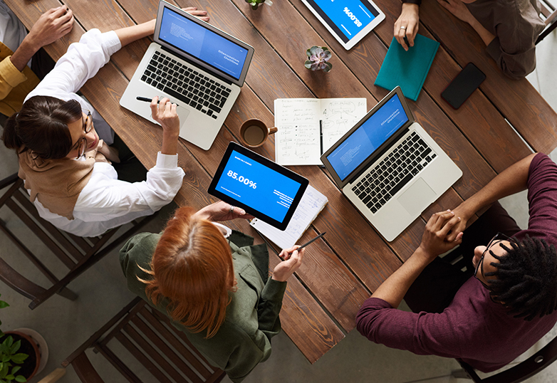 engaged employees around a table