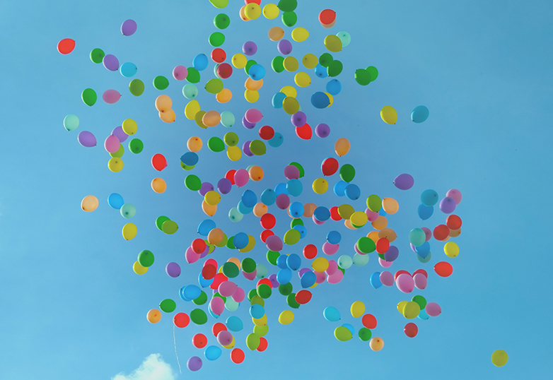 a diverse range of balloons in the air