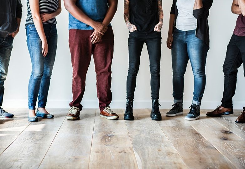 a group of gen z's standing in a room