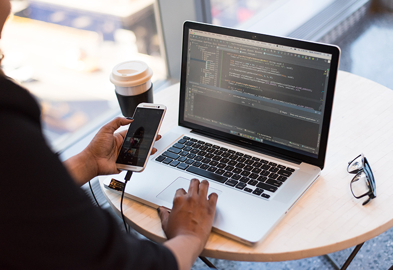 a worker remote working on code