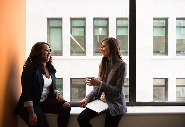 two workers working at a people-first business